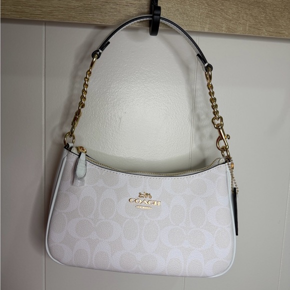 Coach Handbags - Coach Cream Shoulder Bag with Gold Accents